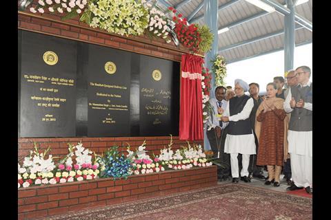 Prime Minister Manmohan Singh flagged off Northern Railway's ceremonial first train on the next section of the rail link to Kashmir on June 26.
